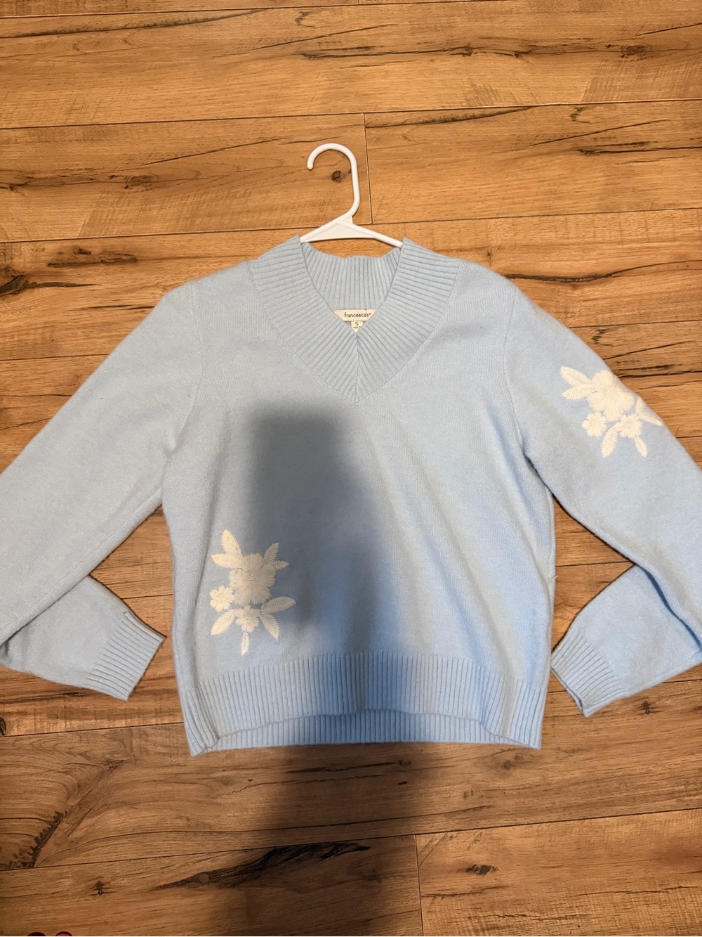 Francesca's Collections Pastel Blue V-Neck Sweater with White Floral Embroidery